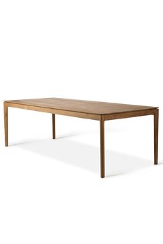 a wooden table on a white background with no one around it or the table top