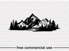 a mountain range with trees on it and the words free commercial use