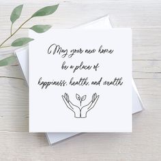 a card with the words may your new home be a place of happiness, health and warmth