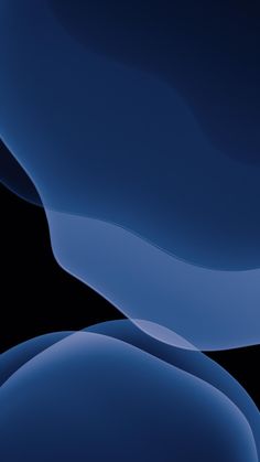 an abstract blue background with wavy lines on the top and bottom of the image is black