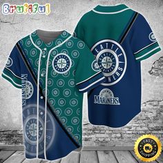 a baseball jersey with the seattle mariners on it is shown in front of a brick wall