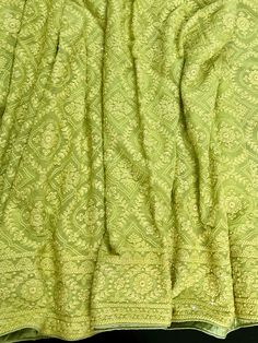 Gorgeous Parrot Green Color Chikankari Saree with Sliver Sequin Work in Pure Georgette with Satin borders (inside part) . The Blouse piece has work on it as well. Item : Saree Base Fabric : Pure Georgette Color : Parrot Green Blouse piece : Comes with un-stitched Blouse piece. Blouse material : Pure Georgette Fall & Edging(Yes/No) : Yes Disclaimer -: - Color variation is possible due to various reasons like phone or desktop setting, resolution etc. Please don't hold us responsible. Our aim is to Green Lehenga With Chikankari Embroidery, Pista Green Georgette Saree With Intricate Embroidery, Unstitched Pista Green Saree With Intricate Embroidery, Green Banarasi Silk Dupatta With Intricate Embroidery, Pista Green Saree With Intricate Embroidery, Festive Pista Green Traditional Wear With Chikankari Embroidery, Navratri Pista Green Lehenga With Chikankari Embroidery, Green Chikankari Embroidery Lehenga In Georgette, Festive Pista Green Dupatta With Chikankari Embroidery