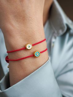 In many tradittion red string bracelets are worn as a symbol of good fortune, prosperity and good fortune. Also Protect its wearer from harmful energy and gives healthy, happiness and good luck Red Bracelet, Greek traditional bracelet, Summer bracelet,Red Evil eye bracelet, spring bracelet, lucky charm, summer bracelet ---Material: Mini evil eye 0,8cm Gold plated 24 k over brass Brass and hight quality enamel ---Size is adjustable for fits all wrist size from 14cm -20 cm For other size please le Red Evil Eye Bracelet, Traditional Bracelet, Gold Evil Eye Bracelet, Red Evil Eye, String Bracelets, Bracelet Summer, Greek Evil Eye, Summer Bracelet, Red Bracelet