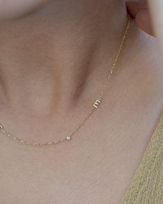 Personalized Asymmetrical 14k solid gold initials necklace with small diamond bezel.Simple, minimalist everyday necklacePerfect wearing alone or layering with your favorite necklaces.• Letter measures approx. 4.8mm• Material: Available in 14K Yellow Gold or 14K White Gold• Diamond: 0.03ct. VS Clarity F-H color * Leave us your initial and placement in the comment box at checkout. Necklace With Initials Letters, White Gold Initial Necklace, Dainty Gold Initial Necklace, Gold Necklace With Initials, Necklace With Small Diamonds, Layered Initial Necklace, Gold Letter Necklace Initials, Gold Necklace With Letter, Necklaces Letter