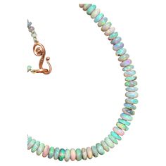 Dalben design hand crafted necklace composed of 38 carat Australian Opals and 18 k rose gold satin finishing closure. The necklace length is 17,9 inch (45,5 cm) . Opals dimension from 4,7x2,7 mm Opals color pastel blue pink and green with blue green light spots. This necklace has been designed and handcrafted in our atelier in Como Italy with a rigorous quality workmanship. Formal Rose Gold Necklaces With Lobster Clasp, Fine Jewelry Round Necklace With Lobster Clasp, Rose Gold Single Strand Necklace As Gift, Rose Gold Single Strand Necklace For Gift, Rose Gold Single Strand Necklace With Round Beads, Adjustable Rondelle Necklaces Perfect For Gifts, Fine Jewelry With Single Strand Rondelle, Fine Jewelry Single Strand Rondelle, Faceted Rose Gold Round Beads Jewelry