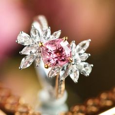 •Condition: Brand new•Center Stone: Natura Pink Spinel from Tanzania, Cushion Cut,  approx 1.16ct, 6.3 x 5.3mm (VVS Clarity)•Side Stone:Natural White Sapphire, Marquise cutNatural White Diamond, Round Cut (VS1 clarity and F color) •Metal Purity: Optional Each piece is made-to-order with care and special attention to detail. all items are made with conflict-free diamonds and gems.The item will be gift wrapped and shipped.---------------------------------------------------------Available in :14k R Elegant Diamond Flower Ring With Accent Stones, Luxury Pink Cluster Ring As Gift, Exquisite Cluster Rings For Gift, Luxury Pink Cluster Ring For Gift, Luxury Cluster Ring Gift, Elegant Cluster Sapphire Ring For Gift, Elegant Cluster Sapphire Ring As Gift, Flower Shaped Diamond Rings With Gemstones, Pink Cluster Ring For Gifts