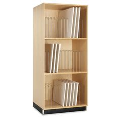 a wooden bookcase with many books on top and white papers in the bottom shelf