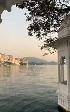 a view of the water and buildings from across the lake