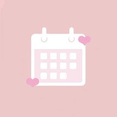 a pink and white calendar with hearts on the side, against a light pink background