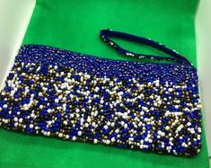 Beaded Wristlet Purse Purple Formal Party Satin Lined White Gold Purple Beads Blue Tiny Beads For Party, Elegant Beaded Bracelets For Parties And Festivals, Elegant Blue Beads For Party, Elegant Blue Party Beads, Elegant Tiny Beaded Bracelets For Party, Elegant Tiny Beads Bracelet For Party, Multicolor Beads For Party And Festivals, Traditional Gold Beaded Bracelets For Party, Beaded Beads For Party And Festivals