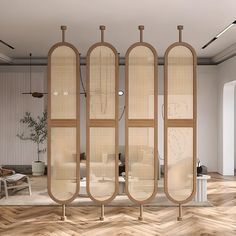 a room divider in the middle of a wooden floor