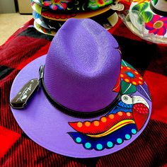 “Hand Painted Panam Style Hat ! Mexican Colorful Design! Painted For “Otomi “Women’s From San Cristobal De Las Casas, Chiapas Mexico Size M/L Color Light Purple! Purple Fedora Beach Hat, Purple Fedora Hat For Beach, Purple Fedora Hat For The Beach, Purple Fedora For Beach, Purple Curved Brim Hat For Vacation, Purple Bohemian Summer Hats, Hat Decorating Ideas, Art Hats, Grape Painting