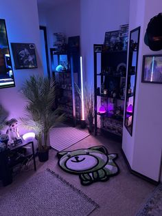 a living room filled with furniture and a green teddy bear rug on top of the floor