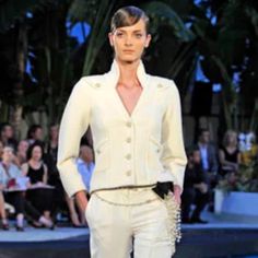 Exquisite And Rare. This Is The Actual Jacket Worn On The Runway In This Photo. This Sample Piece From The Chanel '09 Resort Runway Collection Is The Perfect Staple Piece. Cream Wool Jacket With Cream And Gold Buttons. Inside Is Lined With Silk And Has A Gold Chain Detail At The Bottom. 21.5" Long. Size 38. Freying At One Button Hole. Additional Photos On Request. 2009 Cruise Collection. Luxury Cream Outerwear With Double Button Closure, Luxury Vintage Cream Blazer, Luxury Cream Outerwear With Double-breasted Button, Classic Gold Outerwear With Double-breasted Buttons, Cream Long Sleeve Outerwear With Double-breasted Fastening, Cream Blazer, Chanel Runway, Cruise Collection, Chanel Jacket