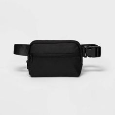 Why we're ALL IN:

Fanny pack is perfect for carrying small essentials while working out or on the go. The main body is made from water-repellant 100% recycled polyester fabric, and it boasts a top zipper closure with inner phone pouch plus a smaller outside zippered pocket to keep small items like keys and snack bars secure and close at hand. Use the adjustable buckle waist strap to find the perfect fit.

All in Motion™: Made for every move, priced for every day. Black Sporty Travel Accessories For Outdoor, Black Sporty Outdoor Travel Accessories, Functional Sports Belt Bag With Cell Phone Pocket, Functional Belt Bag With Cell Phone Pocket For Sports, Sporty Nylon Belt Bag For Sports, Black Nylon Travel Accessories With Zipper Pocket, Functional Belt Bag With Anti-theft Pocket For Outdoor, Practical Nylon Belt Bag For Travel, Black Travel Accessories With Anti-theft Pocket For Outdoor Activities