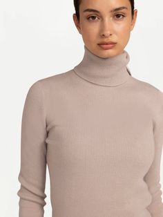 Experience the essence of Italian design and Mongolian craftsmanship with this versatile High-Neck Cashmere Turtleneck. The rib-knit accentuates the body and adds a textural element. The high-neck collar brings a plush warmth. The simplicity of this design allows you endless styling options. Fitted Cashmere Turtleneck Tops, Classic Cashmere Turtleneck Top, Cashmere High Neck Turtleneck, Fitted Cashmere Funnel Neck Turtleneck, Cashmere Soft Knit Funnel Neck Turtleneck, Cashmere Turtleneck, Neck Collar, Turtleneck Sweater, Rib Knit