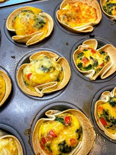 several tortillas are being cooked in a muffin tin