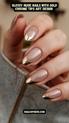 This sophisticated manicure combines timeless nude tones with bold, reflective gold chrome tips. The glossy nude base enhances the natural elegance of the nails, while the metallic gold adds a luxurious edge, creating a perfect balance of subtlety and glamour. The almond-shaped design complements the modern look, making these nails ideal for both formal events and upscale everyday wear. Golden Tip Nails, Gold Ombre Nails Almond, Gold Vacation Nails, Gold Chrome Tips Nails, Nude With Gold Nails, Neutral Nails With Chrome, Gold Outline Nails, Gold Manicure Ideas, Gold Chrome Almond Nails