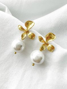 "Pearl Flower Earrings, Pearl Bridal Earrings, Wedding Jewelry, Bridesmaid Earrings, Mallorca Pearl Earrings, Gifts For Her Handmade gold plated brass earrings Mallorca pearl Earrings are very light. They don't hurt your ears, so you can wear them for hours and hours without noticing Comes beautifully cutest packaging 💝 Tarnish resistant 💦 Perfect gift for love ones or lovely treat to yourself gift 🎁 Ready to ship in one working day flight ✈️ Please contact me if you are any questions 💖 The Pearl White Flower-shaped Earrings For Party, Wedding Pearl Earrings With Flower Shape, Delicate Flower-shaped Bridal Earrings For Parties, Delicate Flower Shaped Bridal Earrings For Party, Delicate Flower Shape Bridal Earrings For Party, Feminine Pearl Flower Earrings For Weddings, Feminine Flower-shaped Pearl Earrings For Weddings, Wedding Pearl Drop Earrings With Flower Charm, Gold Pearl Earrings With Flower Charm For Wedding