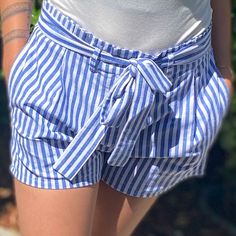 Blue Striped Shorts With Front Tie High Waist Material: 60% Cotton , 40% Polyester Striped Summer Bottoms For Day Out, Blue Bottoms With Tie Waist For Beach Season, Blue Tie Waist Bottoms For Beach Season, Blue Shorts With Tie Waist For Spring, Blue Tie Waist Shorts For Spring, Summer Bottoms With Tie Waist, Summer Shorts With Tie Waist, Blue Bottoms With Tie Waist For Spring, Blue Tie Waist Bottoms For Spring