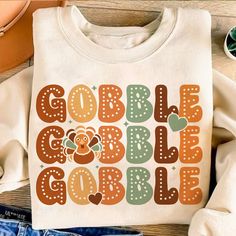 a white shirt with the words gobble gobble on it