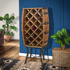 a wooden wine rack in the corner of a room