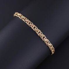 This vintage Italian bracelet (circa 1980-1990) features woven links of 14k gold. The bracelet measures 7 inches by 0.25 inches wide, and it is in great condition.  It weighs 3.84 grams.  We have many other fantastic offerings of period fine and costume jewelry posted on our Etsy store, so please consider browsing our other items. We send all items in individually packaged gift boxes and offer layaway plans! + Trademark Antiques Shop Homepage https://www.etsy.com/shop/TrademarkAntiques + Our Store Policies https://www.etsy.com/shop/TrademarkAntiques/policy?ref=shopinfo_policies_leftnav + Connect with us on Social Media (Get access to monthly giveaways, special sales, and sneak peeks at our new items before they're listed on our store) FACEBOOK- https://www.facebook.com/trademarkantiques IN Elegant Gold Bracelet With Wheat Chain As A Gift, Elegant Gold Braided Bracelet For Formal Occasions, Classic Gold Braided Bracelet For Formal Occasions, Formal Gold Bracelet With Wheat Chain, Formal Gold Braided Jubilee Style Bracelet, Formal Gold Braided Jubilee Bracelet, Elegant Wheat Chain Bracelet For Formal Occasions, Formal Yellow Gold Bracelet With Wheat Chain, Classic Gold Bracelet With Wheat Chain