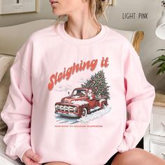 Vintage Sleighing it to Holiday Happiness Shirt Christmas Holiday Sweatshirt Vintage Womens Christmas Sweater Christmas Crewneck Party Shirt Ideal for any situation, a unisex heavy blend crewneck sweatshirt is pure comfort. These garments are made from polyester and cotton. This combination helps designs come out looking fresh and beautiful. The collar is ribbed knit, so it retains its shape even after washing. There are no itchy side seams on these sweaters.  .: Made with a medium-heavy fabric Shirt Outfit Ideas, Vintage Christmas Sweaters, Movie Cinema, Happy Shirt, Christmas Sweaters For Women, Womens Christmas, Christmas Crewneck, Holiday Sweatshirt, Sweatshirt Vintage