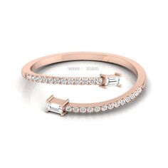 a rose gold ring with two baguetts and diamonds