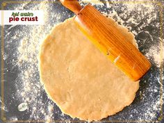 an uncooked pizza dough with a rolling pin on it and the words not under pie crust written below