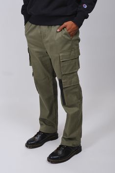 Elevate your wardrobe with our latest innovation: the Stretch Twill Utility Cargo Pant. Seamlessly blending a timeless workwear aesthetic with modern functionality, this pant is crafted from our top-selling fabric, ensuring comfort and durability. With strategically placed cargo pockets, it offers both utility and style in equal measure. Embrace all-day comfort and effortless style with this must-have piece. Don't let this essential addition slip away – grab yours today! Style: BPMH839S Techwear Pants With Patch Pockets For Work, Techwear Bottoms With Patch Pockets For Work, Functional Cargo Pants With Cargo Pockets For Work, Functional Cargo Pants With Multiple Pockets For Work, Techwear Full-length Work Pants With Cargo Pockets, Functional Cotton Pants With Pockets, Functional Tapered Leg Cargo Pants, Utility Cargo Pants With Tapered Leg, Functional Cotton Cargo Pants