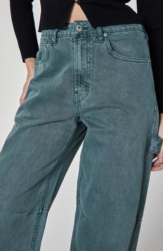 Carpenter pockets and a hammer loop lend bold workwear edge to these cargo-style jeans boasting a unique hue and relaxed, high-waisted silhouette. 29" inseam; 18" leg opening; 12 1/2" front rise; 15 1/2" back rise Zip fly with button closure Five-pocket style; hammer loop; back utility patch pockets 100% cotton Machine wash, line dry Imported Utility Cargo Jeans With Five Pockets For Fall, Trendy Tapered Leg Cargo Pants With Five Pockets, Utility Cargo Jeans In Denim Blue For Fall, High Rise Denim Blue Cargo Pants For Fall, High Rise Dark Wash Cargo Pants For Fall, Urban Cargo Jeans With Side Pockets For Work, Urban Cargo Jeans For Work, High Rise Cargo Jeans For Workwear With Pockets, Tapered Leg Cargo Jeans For Fall