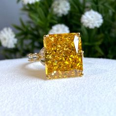 Vintage 15K 610 Solid Gold Yellow Sapphire, White Topaz Ring ...Marked 610 means 61% of Gold...Total of weights 6.9grams...Size 7...Measure of stone center 14 x 12MM ( 12.14ctw ) ....It's in very good condition. Yellow Gold Citrine Diamond Ring With Accents, Yellow Gold Diamond Ring With Citrine Accents, Yellow Cushion Cut Jewelry With Prong Setting, Yellow 14k Gold Jewelry With Diamond Accents, Gold Cushion Cut Topaz Ring For Formal Occasions, Luxury Gold Jewelry With Accent Stones, Formal Gold Cushion Cut Topaz Ring, Gold Topaz Ring In Fine Jewelry Style, Rectangular Gold Diamond Ring In Prong Setting