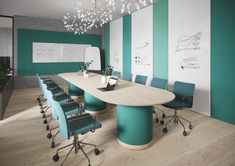 a conference room with blue chairs and green walls