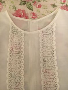 This beautiful blouse was part of my Mum's collection from the 1960's.  Short sleeves twin lace insert & tiny pintucks down the front and buttoned centre back to close. Bust 100cm Waist 94cm Centre front 49cm Centre Back 54cm Neck to sleeve end 27cm Sleeve width around arm 44cm  Sent with Australia Post Standard Small Satchel Classic Lace Tops With Lace Work, Classic White Lace Tops, Classic Blouse With Lace Cuffs For Daywear, Daywear Lace Top With Lace Cuffs, Classic White Tops With Lace Work, Classic Lace Tops For Daywear, Lace Top With Lace Cuffs For Daywear, Elegant Broderie Anglaise Lace Top For Daywear, Vintage White Top With Lace Collar For Daywear