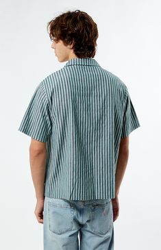 The Embroidered Stripe Camp Shirt from PacSun elevates your everyday style with its trendy design and comfortable cotton blend. Featuring a collared neckline, button closures, stripes, and an embroidered logo on the left chest, this regular fit shirt is a versatile addition to any wardrobe.


	Collared neckline
	Short sleeves
	Standard fit
	Button closures
	Left chest embroidery
	80% Cotton, 20% polyester
	Machine washable
	Model is wearings size medium
	Model Measurements: 6’1”  Height, 30” Waist, 35” Hips Mens Striped Tshirt, Summer Stripes Outfit, Striped Tshirt Men, Stripes Outfit, Striped Tshirt, Mens Stripes, Summer Stripes, Camp Shirt, Christmas 2024