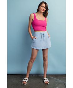 This chic french terry causal skort is an effortlessly stylish piece that prioritizes both comfort and versatility. It features an adjustable drawstring for a customized fit, complemented by an elastic waistband ensuring ease of movement. The skort is thoughtfully designed with practical side pockets and stylish side slits, adding functionality and flair. Whether you're headed to a casual outing, planning a picnic, lounging at home, or engaging in a leisurely game of tennis, this skort is the pe Womens Skorts, White Sky, French Terry Fabric, French Terry, Sky Blue, Blue Sky, Elastic Waist, Tennis, Elastic