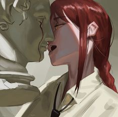 two people with red hair are facing each other and one is looking at the other