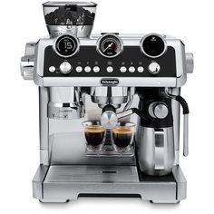 an espresso machine with two cups on it