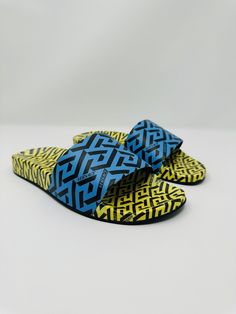 Product Details * TPU upper * Open toe * Slip-on * Polyurethane footbed * TPU Sole * Made in Italy All merchandise is 100% Authentic. Blue Sandals, Slide Sandals, Blue Yellow, Open Toe, Versace, In Italy, Slip On, Italy, Sandals