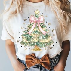 Watercolor Christmas Tree Girly T-Shirt Explore Our Newest Gildan 5000 T-Shirt Collection, Crafted For Ultimate Style, Versatility, And Comfort! Available In Sizes From S To 3xl And A Variety Of Vibrant Colors Such As Black, White, Sand, Green, Sport Grey, Red, Navy, And More, There's A Perfect Option For Everyone. Made From High-Quality Materials, These T-Shirts Offer A Soft, Premium Feel While Ensuring All-Day Comfort. Built To Last, They Retain Their Shape And Color Even With Frequent Wear And Washing. Enjoy Quick And Dependable Shipping, With Your Order Delivered Straight To Your Door In No Time. Note: If You Need To Adjust Your Size Or Color, Please Contact Us After Placing Your Ord Girly Tshirt, Bow Tree, Coaster Sublimation, Glitter Christmas Tree, Christmas Coquette, Christmas Tree Png, Watercolor Christmas Tree, Trendy Products, Tree Png