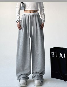 Features: These streetwear black sweatpants are a must-have in any fashion-forward woman's wardrobe. The vintage high waist design adds a touch of nostalgia while the patchwork details and loose fit give a modern twist. Made from high-quality materials, these trousers offer both style and comfort for any casual occasion. American Clothes, Y2k Trousers, Wide Leg Pants Jeans, Streetwear Sweatpants, Sweatpants For Women, Sweatpants Women, Fits Clothes, Tomboy Outfits, Black Sweatpants