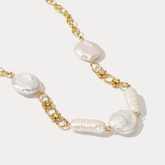 Treat yourself to the beauty of a timeless classic. Our Pearl Hollow Necklace is the perfect accessory to enhance any look. Crafted with a delicate chain that gracefully cradles a semi-hollow pearl, it emanates a subdued elegance with its unique and sophisticated style. Immerse yourself in this ultimate emblem of luxury. DETAILS Plating: 18K Gold Materials: 18K Gold on Brass, Freshwater Pearl Measurements: Length: 15.75"(40.0cm) + Extender: 2.36"(6.0cm) Weight:  21.77 g Note: It will be in stock White Pearl Necklace With Delicate Metal Chain, Diamond Star Necklace, Luxury Details, Pearl Jewelry Gift, Star And Moon Necklace, Diamond Evil Eye, Lucky Bracelet, 18k Gold Necklace, Evil Eye Earrings