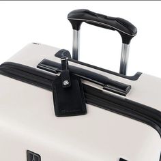 Dimensions: 13'L x 17.25'W x 25'H.Suitcase weight: 12.3 lbs..Curated by industry experts to indulge the insatiable traveler, this coordinating collection of beautifully crafted, ultra-resilient bags offers ample storage options and built-in organization..PowerScope Lite handle.Expandable.TSA lock.PrecisionGlideTM System delivers precise control, with MagnaTrac(R) self-aligning magnetic spinner wheels.Scuff-resistant exterior.Zip interior divider with multiple pockets, water-resistant pocket.Manufacturer's limited lifetime warranty.Imported.Web ID: 4087359.Polycarbonate; trim: leather; lining: polyester.Wipe clean Classic Rectangular Travel Accessories For Weekend Trips, Elegant Rectangular Luggage For Weekend Trips, Luxury Rectangular Travel Accessories Case, Classic Rectangular Luggage For Trip, Classic Rectangular Travel Accessories For Business Trips, Classic Travel Cases With Luggage Sleeve, Luxury Rectangular Travel Cases, Luxury Rectangular Cases For Trip, Luxury Travel Luggage With Rectangular Case