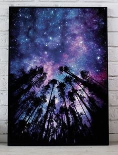 the night sky is filled with stars and trees