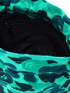 SAINT Mxxxxx's pouch is designed in collaboration with Japanese streetwear label BAPE®. It's made from canvas printed with its signature camouflage pattern and has a matching chain-embellished strap. Inside, there's space for your sunglasses and cardholder and a zipped pocket that's ideal for securing smaller items. Green Zipper Closure Bag For Streetwear, Japanese Streetwear Mens, Nike Summer Shoes, Military Camouflage Cargo Shorts For Streetwear, Camouflage Military Trucker Hat For Streetwear, Snap Bag, Military Camouflage Outerwear With Pockets, Camouflage Military Trucker Hat One Size, Tom Ford Bag