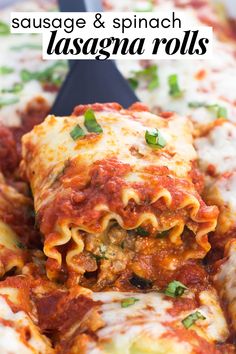 lasagna rolls with sauce and spinach on top