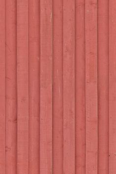 an image of a red wall that looks like it is made out of wood