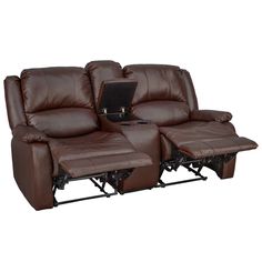 the reclining loveseat has two seats and a laptop on it