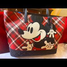 Brand New With Tags Disney Loungefly Plaid Purse Tote. Extremely High Quality. Faux Leather With Printed And Applique Details Wipe Clean; Imported Top Zipper Closure; Dual Carry Handles; Glove Bag Charm; Enamel Brand Plaque On Back Two Interior Slip Pockets And One Zippered Pocket; Fully Lined, Printed Interior; Contrast Quilted Bottom Trim *Does Not Come With The Matching Wallet In My Photos* Approximate Measurements: 16" X 12" X 5.5" Will Package With Care. Retailed $200 Trendy Red Bags For Disney Trips, Red Disney Travel Bag, Red Minnie Mouse Bag For Daily Use, Disney Red Travel Bag, Multicolor School Bag With Mickey Mouse Design, Casual Red Mickey Mouse Bag, Red Minnie Mouse Bags, Disney Red Rectangular Bags, Red Mickey Mouse Casual Bag